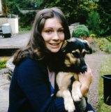 Mum with her first doggo, Bilbo Baggins.